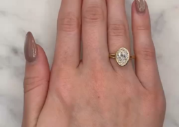 Jeweler shared a video of my completed ring! It features a 2-carat oval gemstone set in a yellow gold split shank bezel.