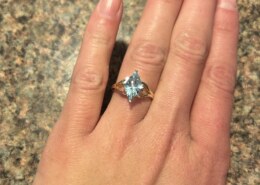 The blue topaz ring that my fiancé and I chose together at an antique fair.
