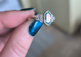 What causes the front surface to appear “oily”?